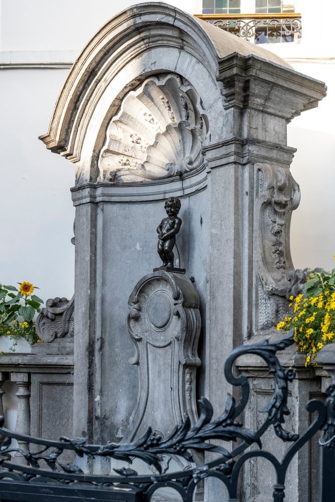 Severdigheter i Brussel: 18 ting å gjøre, fra Grand Place og Atomium til sjokolade og øl 3 Bronsestatuen Manneken Pis i Brussel