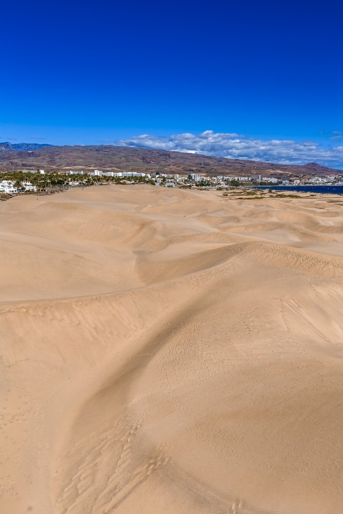 Sanddynene ved Maspalomas med hotellene i Playa del Inglés