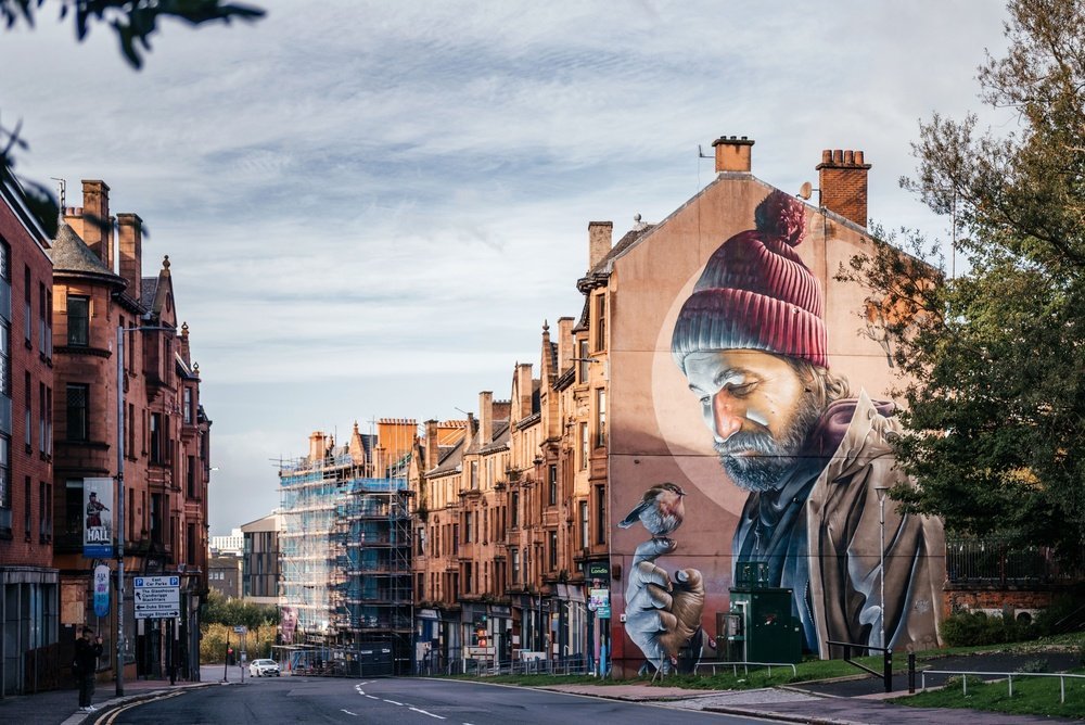 Veggmaleriet av St Mungo på High Street i Glasgow